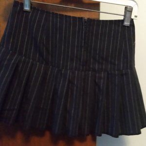 Black mini skirt with white pinstripes